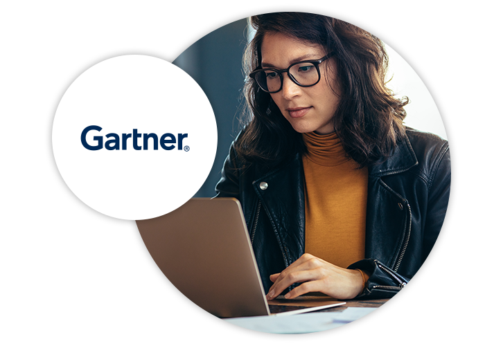 Woman reading Gartner Report and Gartner logo